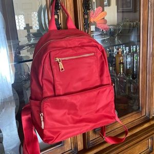 Red satin backpack medium size lots of room and pockets!